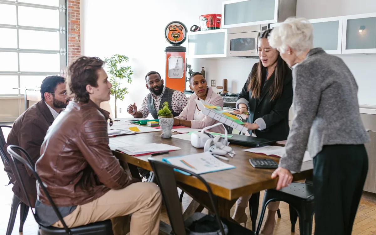 Diverse fintech team in a modern office representing the clients INFINET serves